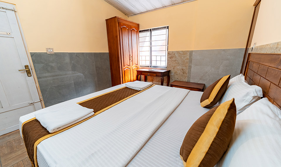 Prestige Holidays Munnar- Deluxe Room